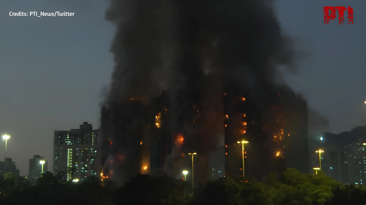 At Least 94 Dead as Hong Kong High-Rise Towers Burn for Second Day in City’s Deadliest Fire Disaster in Decades