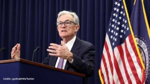Federal Reserve Cuts Key Rate, Projects Healthier US Economy Next Year